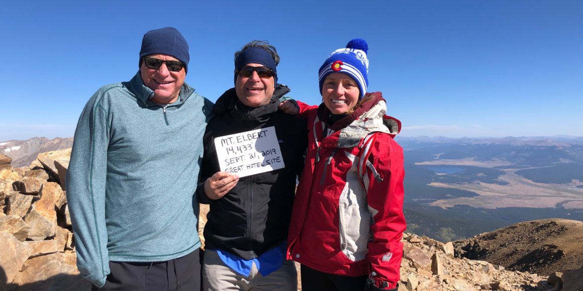 mcwhinney employees hiking a colorado fourteener