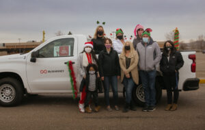 mcwhinney employees gathered for a holiday parade